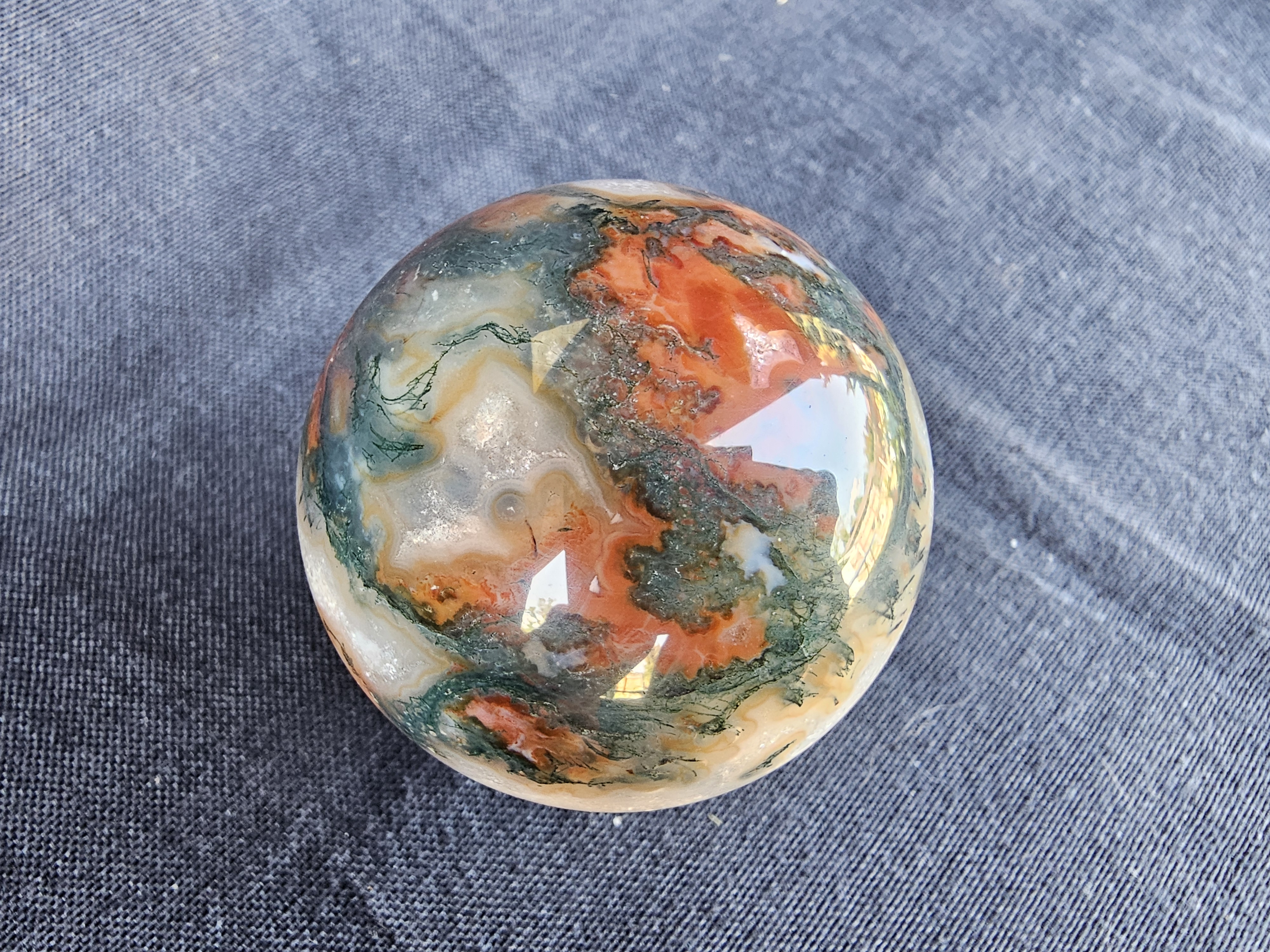 Amazing and unusual red moss agate sphere!