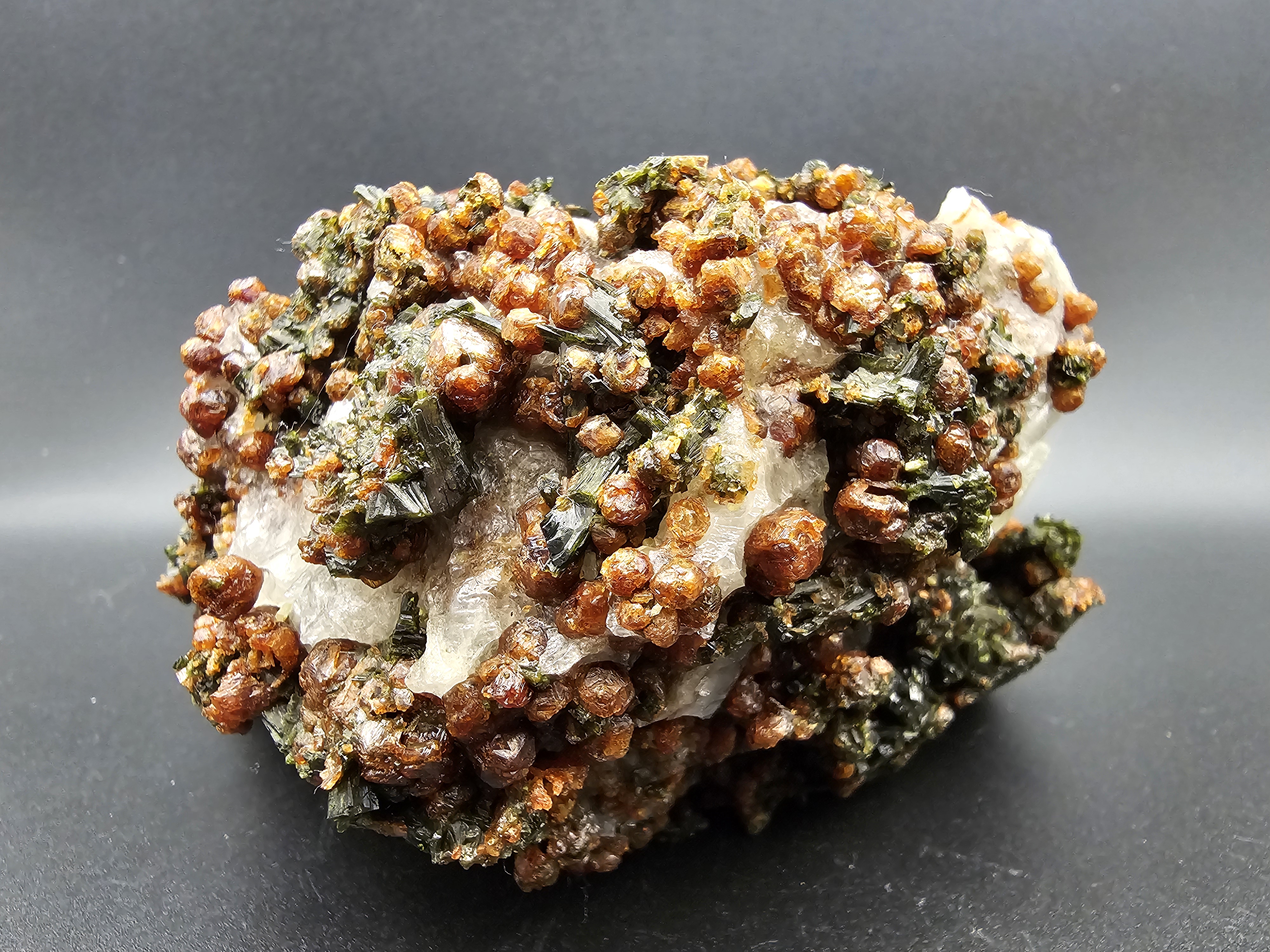 TONS of Raw Garnet and Epidote on a Calcite Host Material