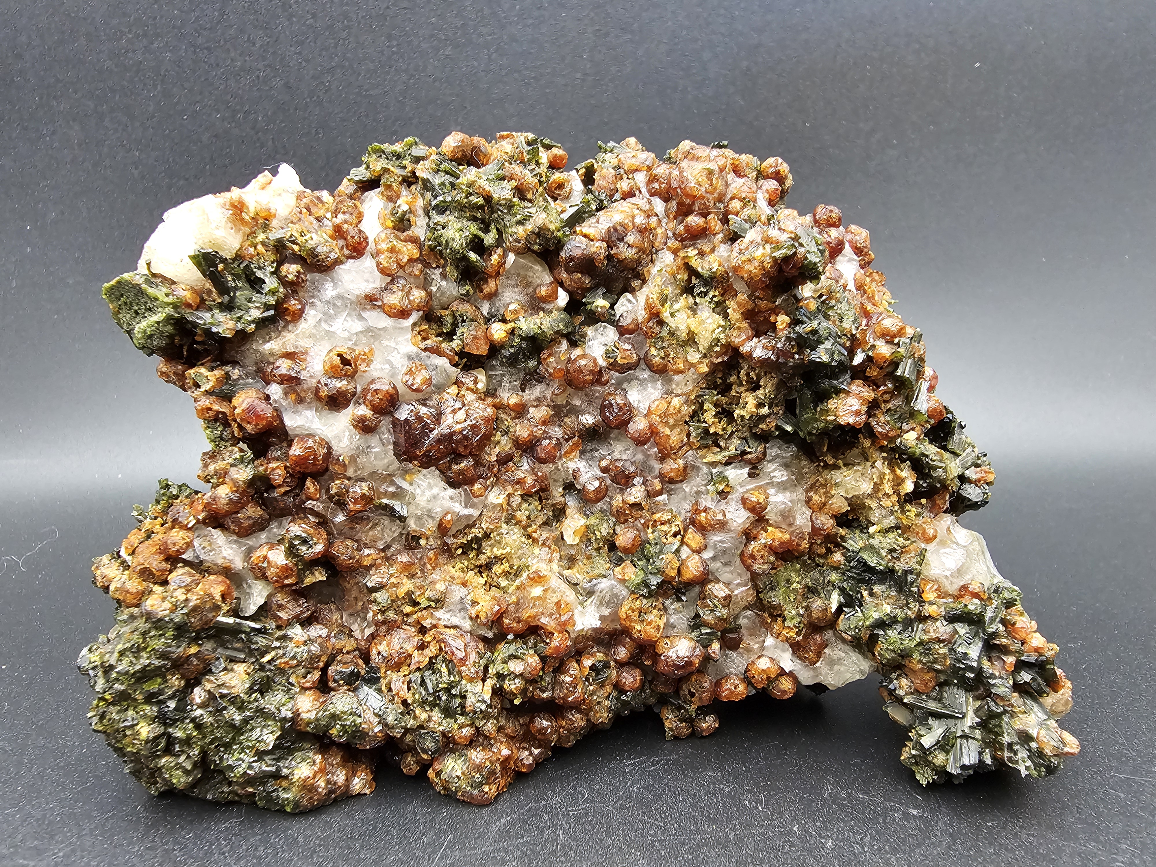 TONS of Raw Garnet and Epidote on a Calcite Host Material