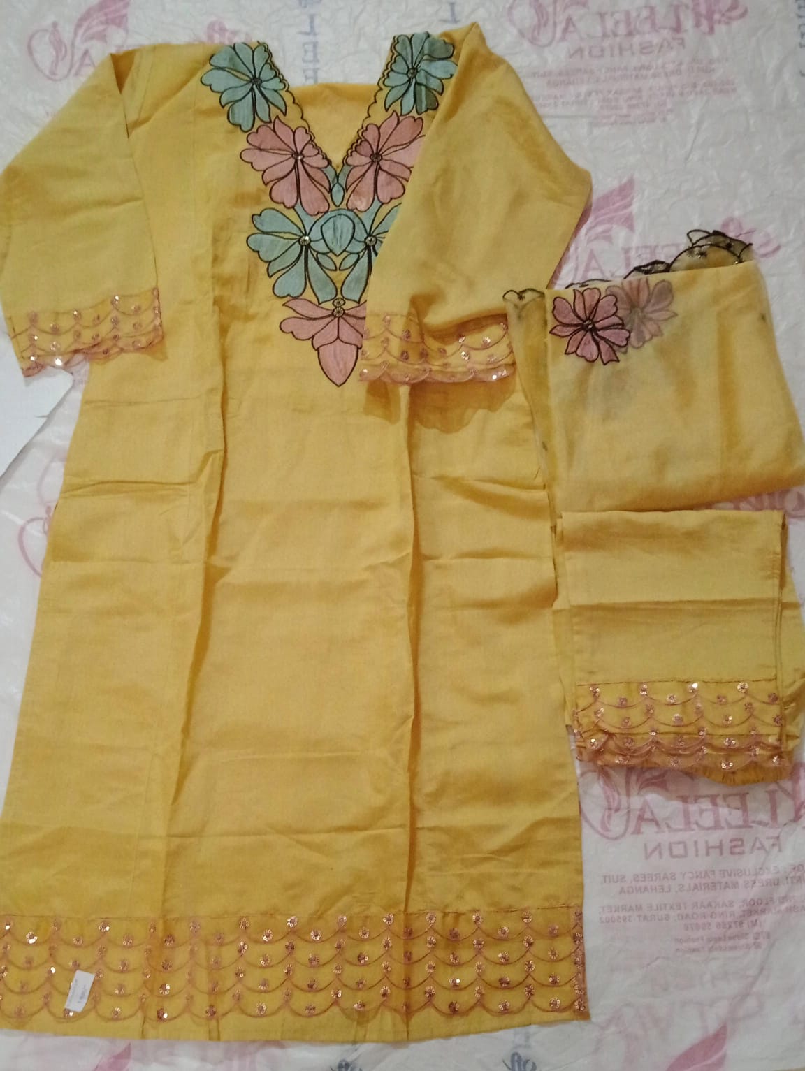 Yellow embroidered traditional dress
