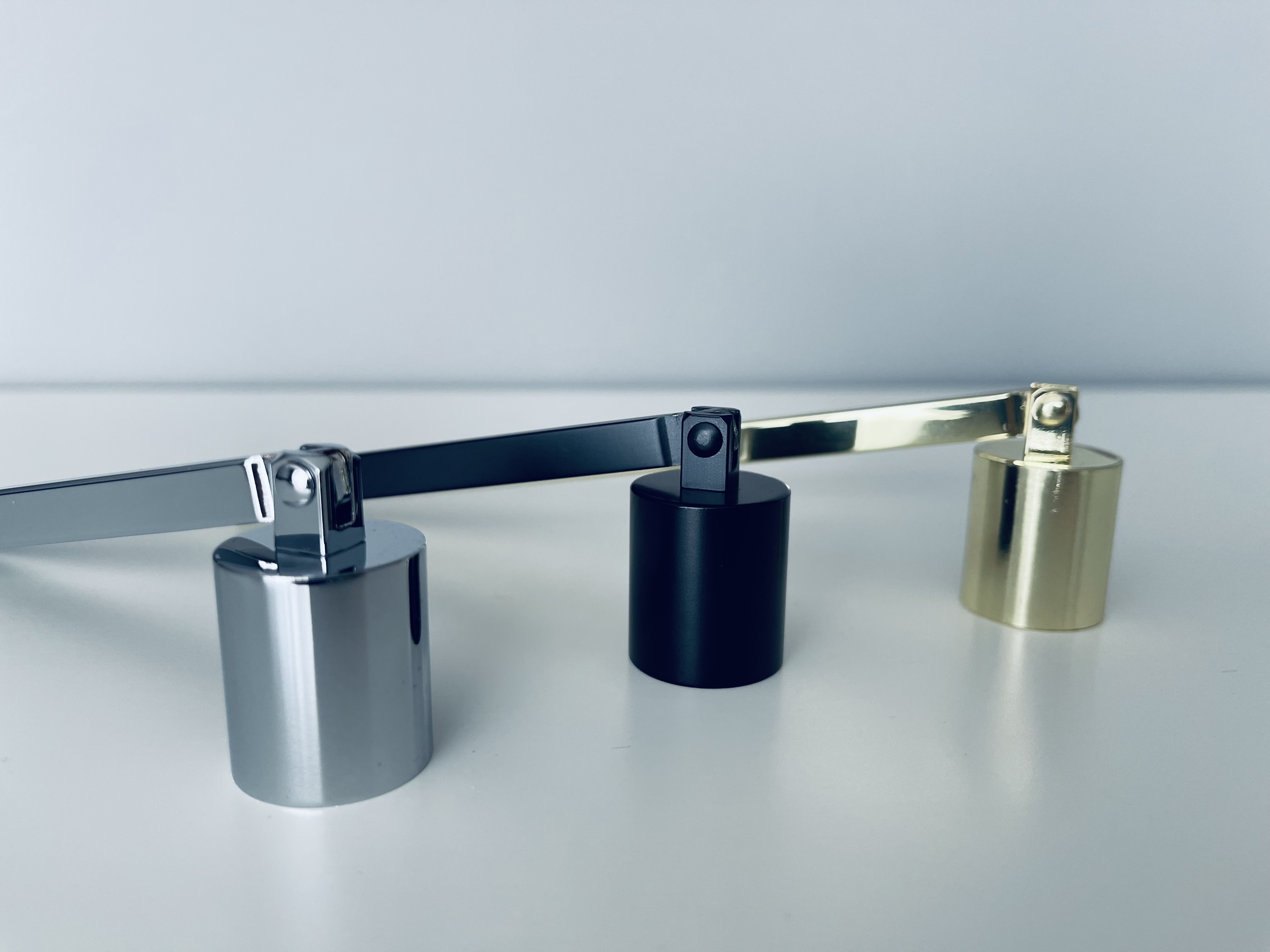 Įrankis žvakei gesinti