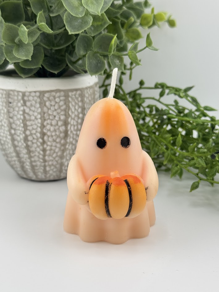 Ghost Holding Pumpkin Candle