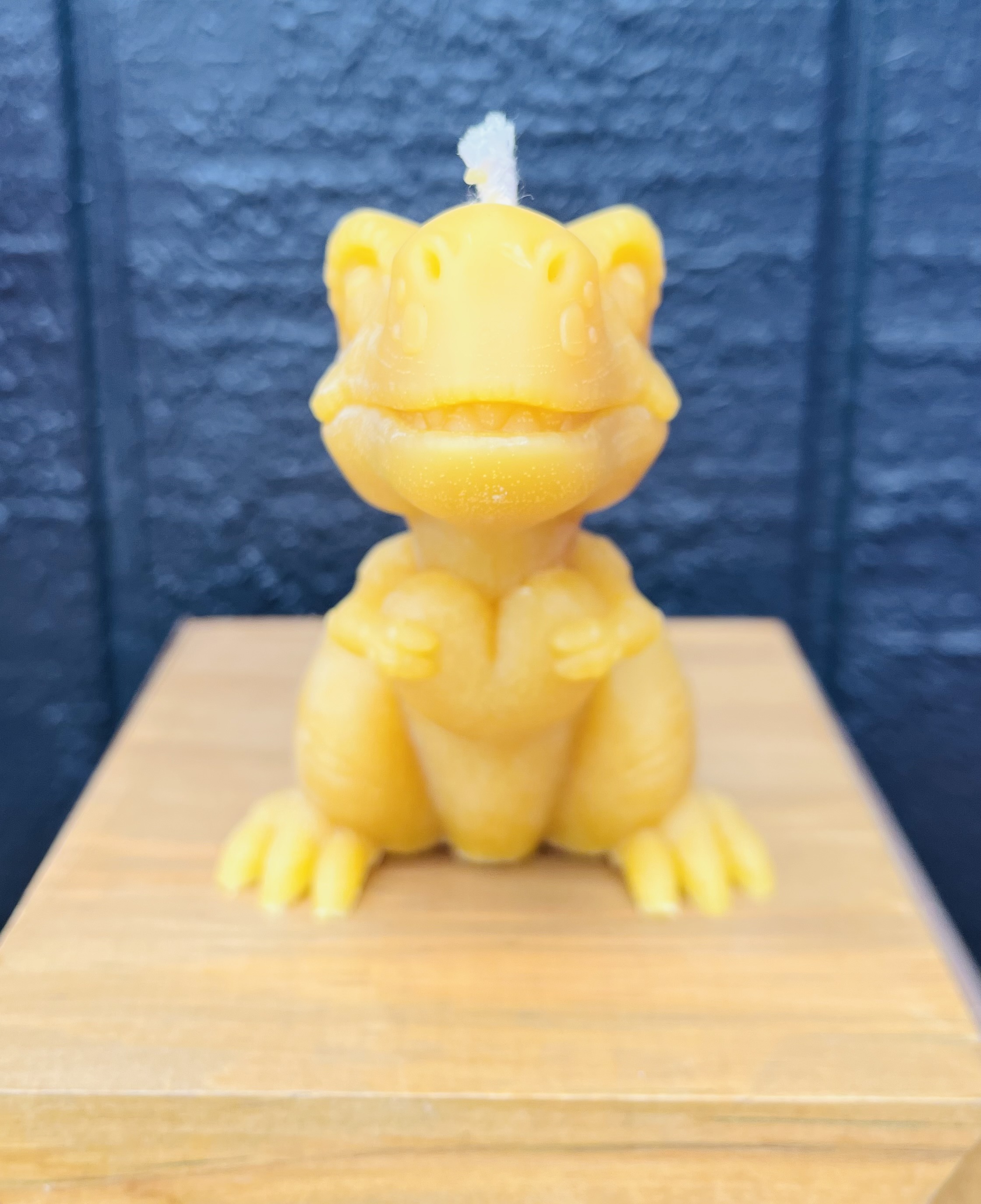 Dinosaur beeswax candle