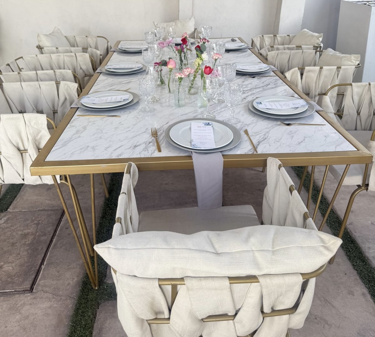 Mesa tipo mármol con silla de herrería