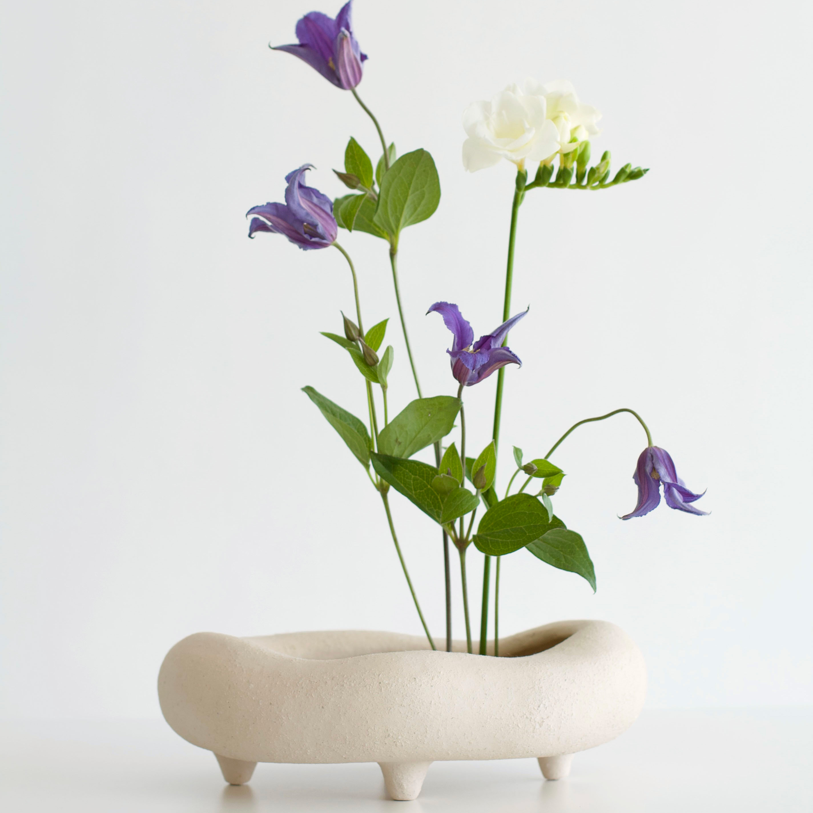 Shallow beige ikebana vase
