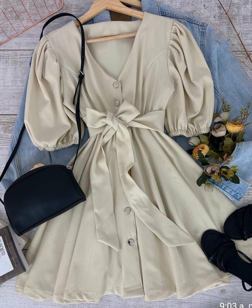 Vestido beige con lazo