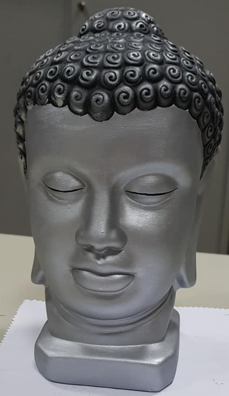 Escultura cabeça de Buda