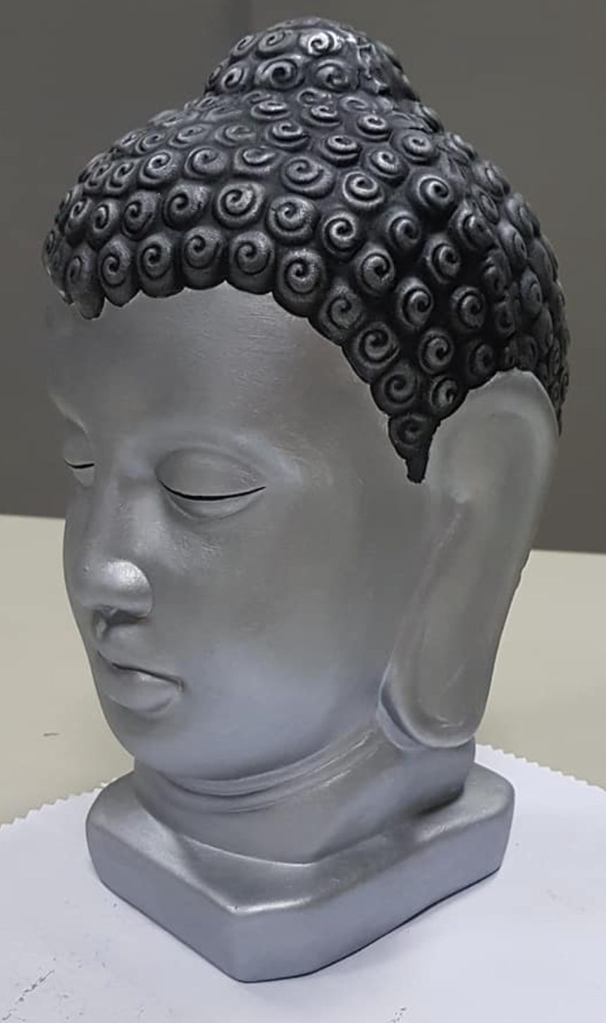 Escultura cabeça de Buda