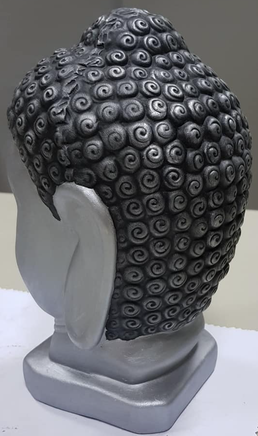 Escultura cabeça de Buda