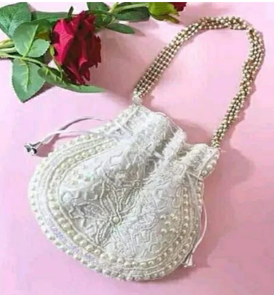 INTERBEST | Embroidered textile pouches and wallets