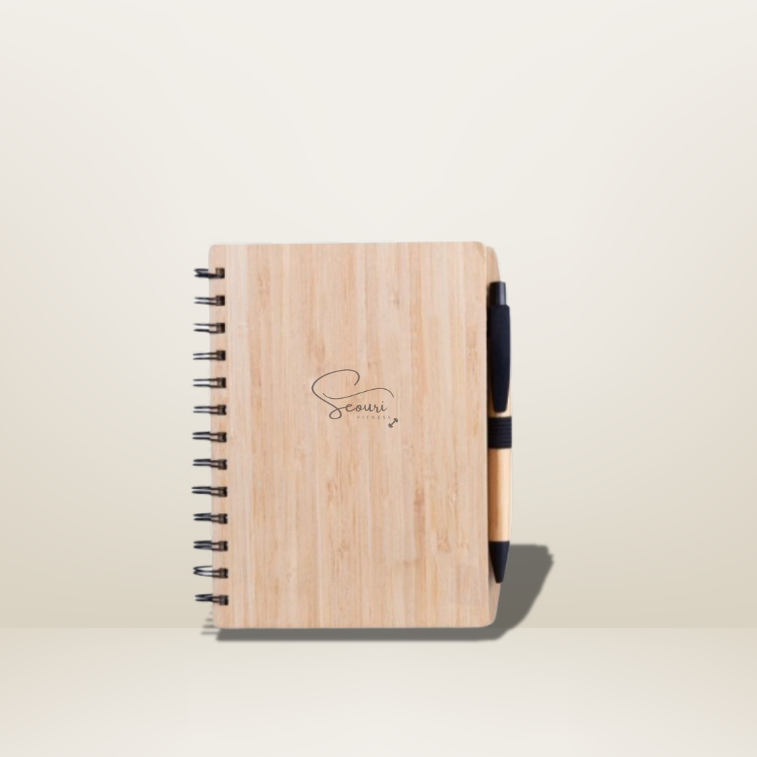 Cuaderno con bolígrafo