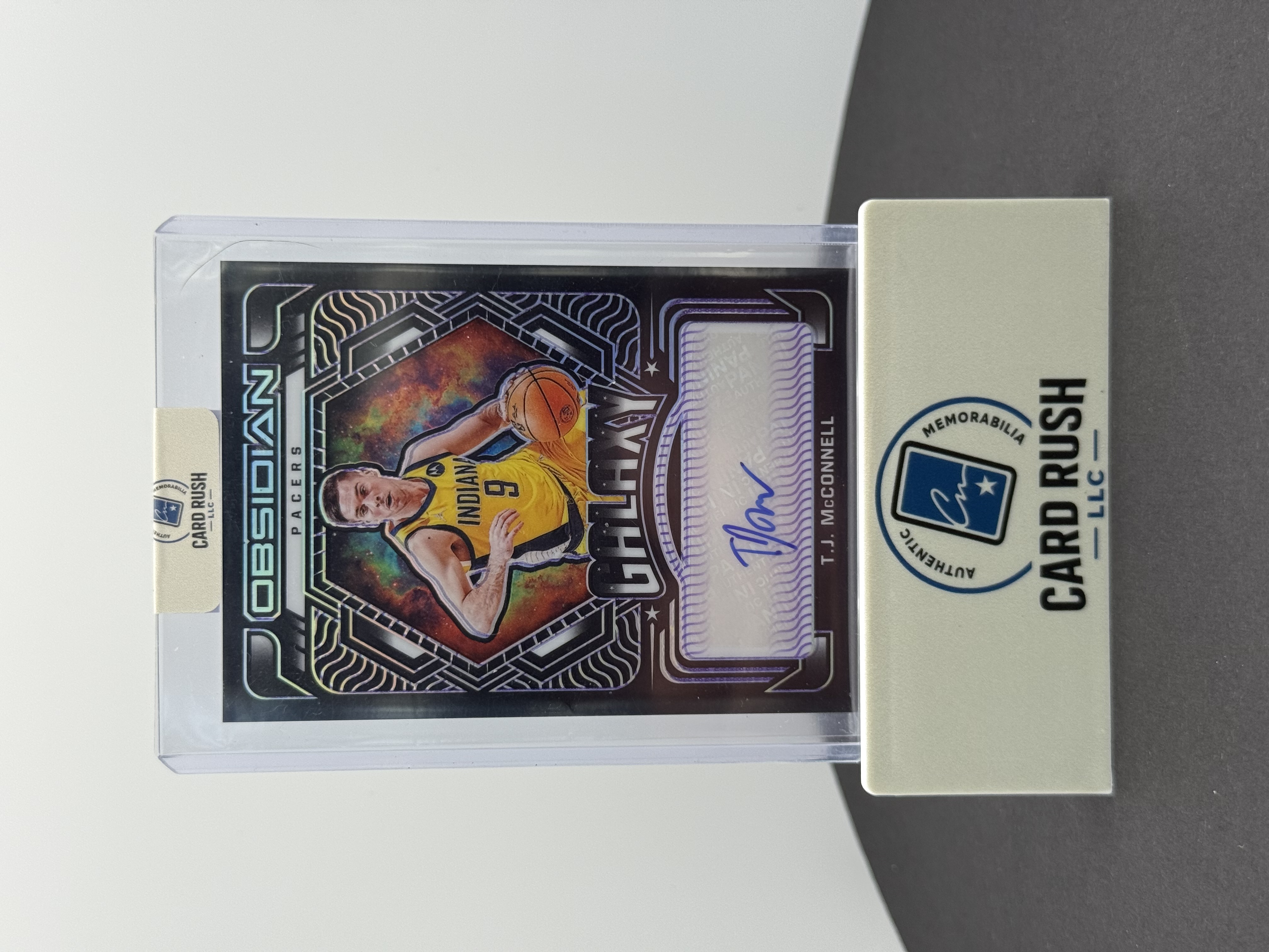 2020-21 Panini Obsidian Galaxy T.J. McConnell Obsidian Autograph Basketball Card