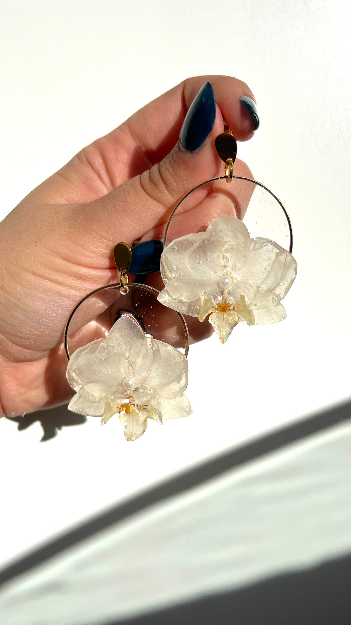 Cénit - Orquídeas blancas