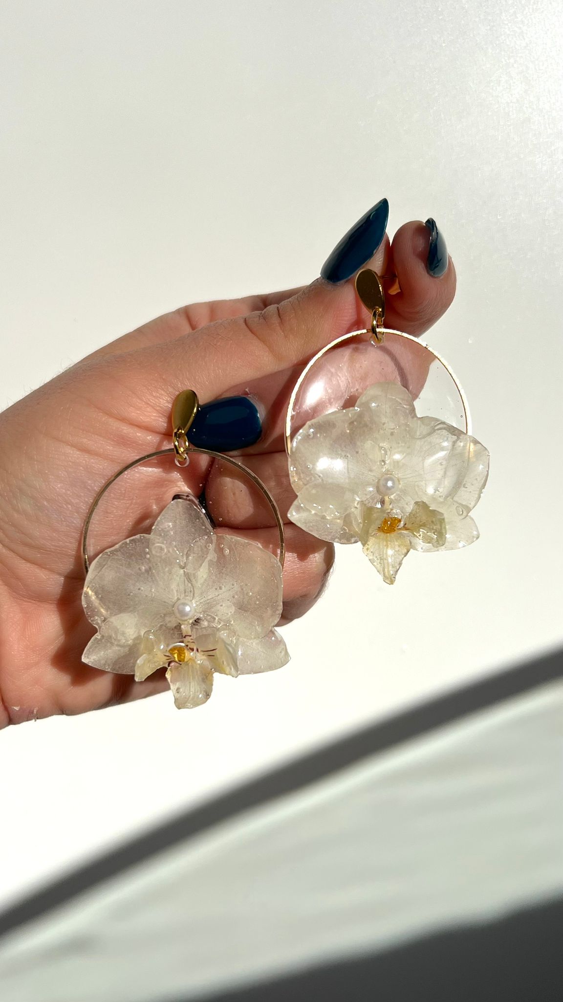 Cénit - Orquídeas blancas