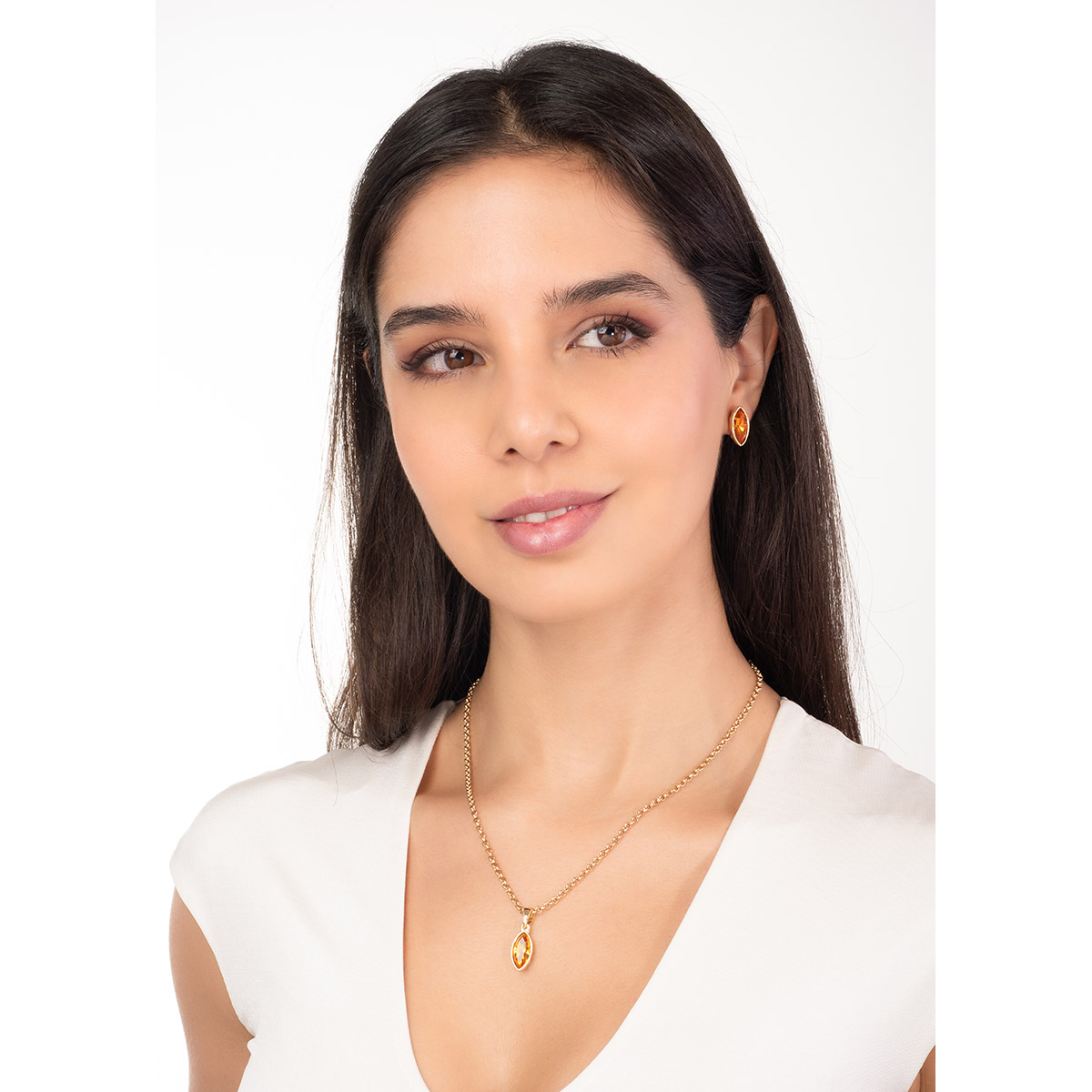 Gold plated earrings with oval amber tone stone design