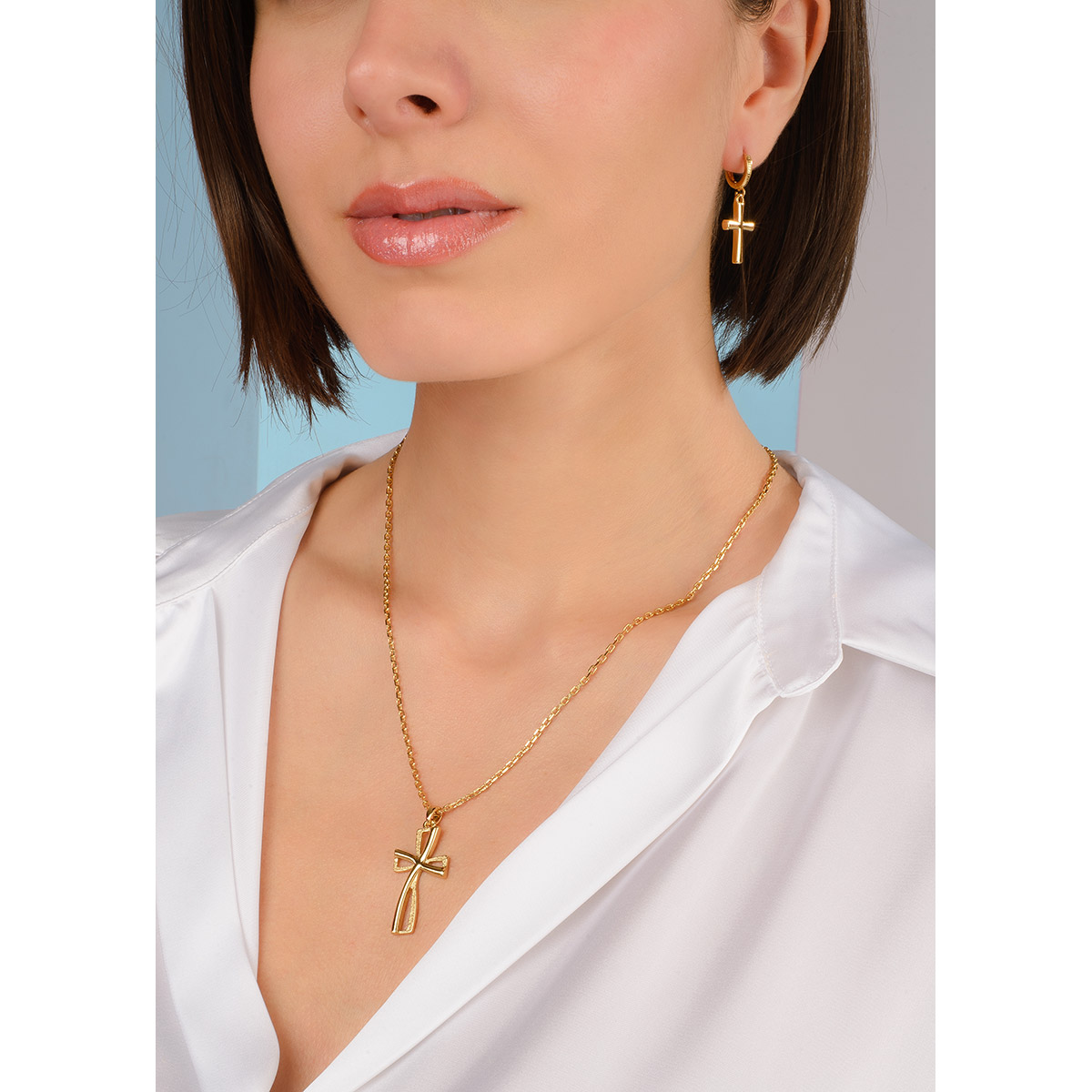 Hoop earrings with hanging cross