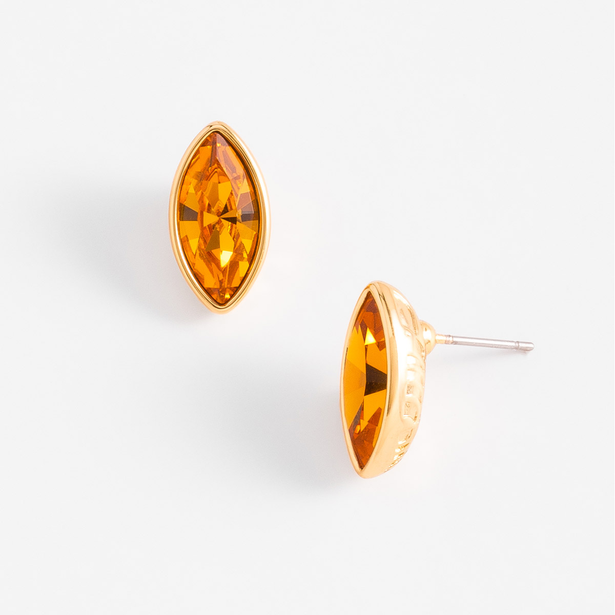 Gold plated earrings with oval amber tone stone design