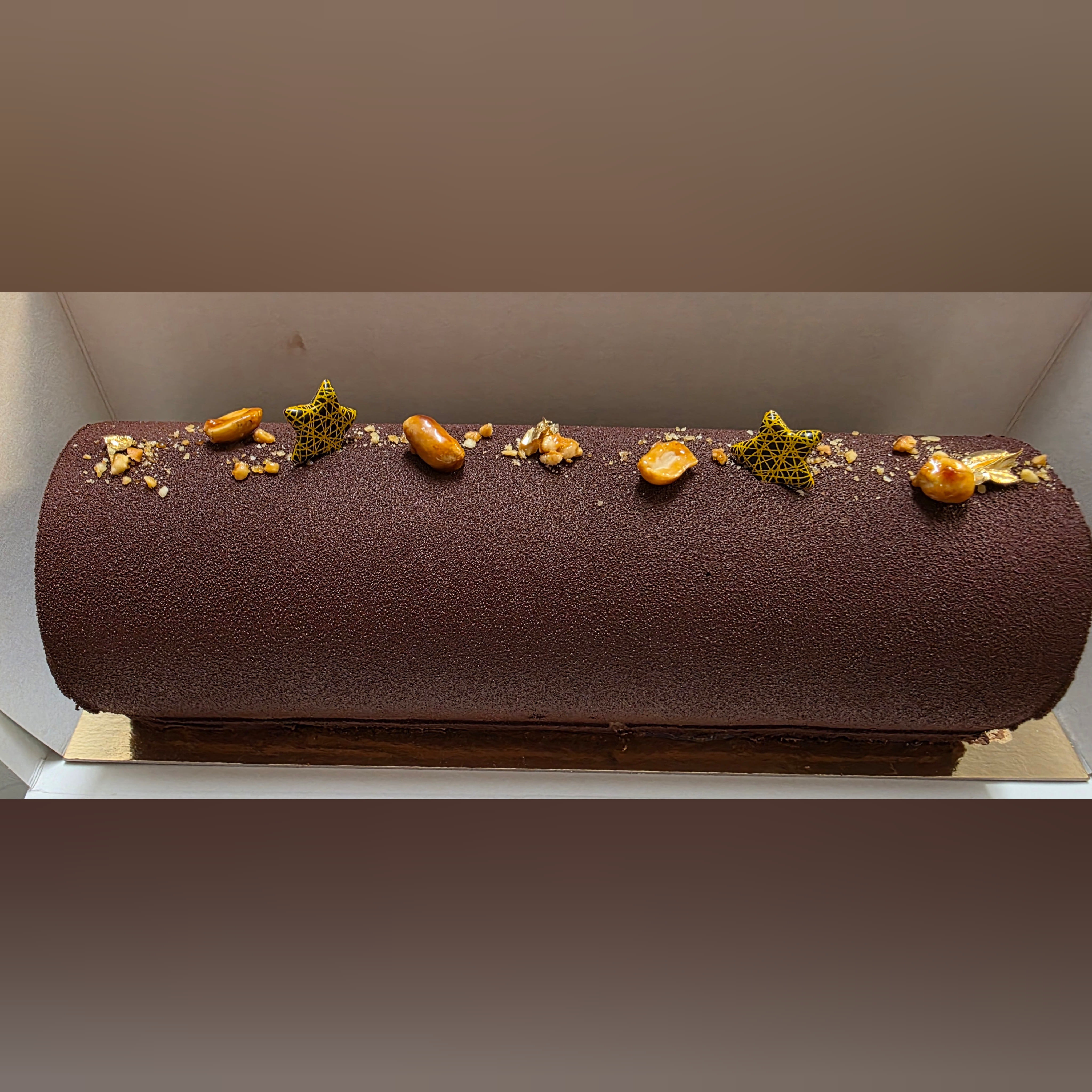 Bûche Chocolat Poire Cacahuètes