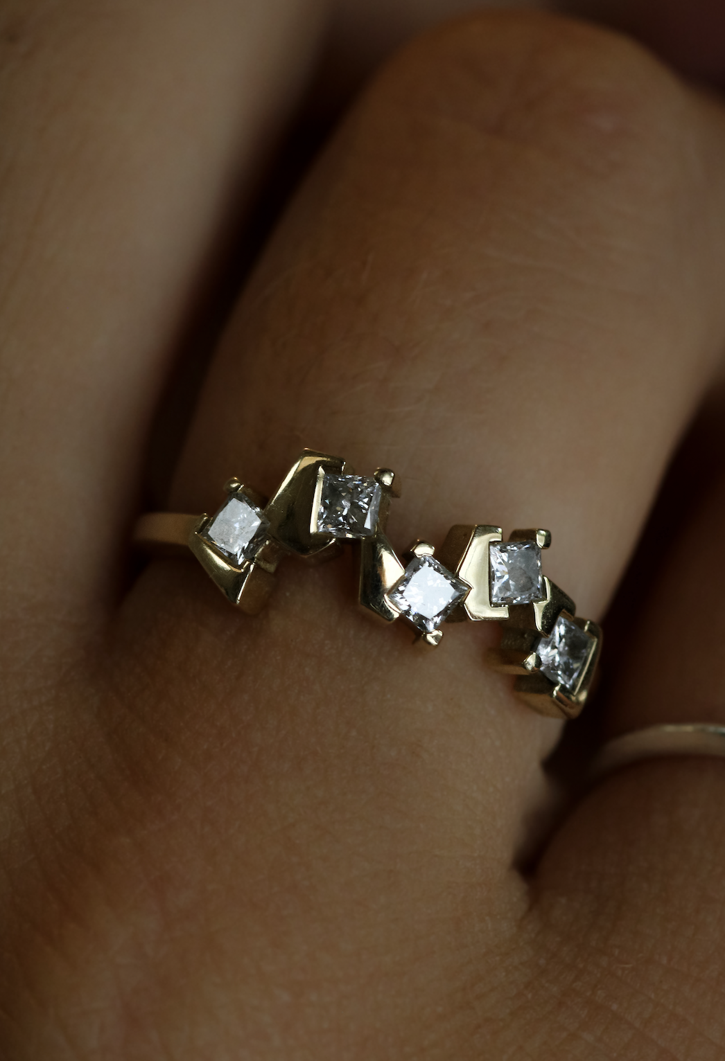 Gold ring with 5 square diamonds