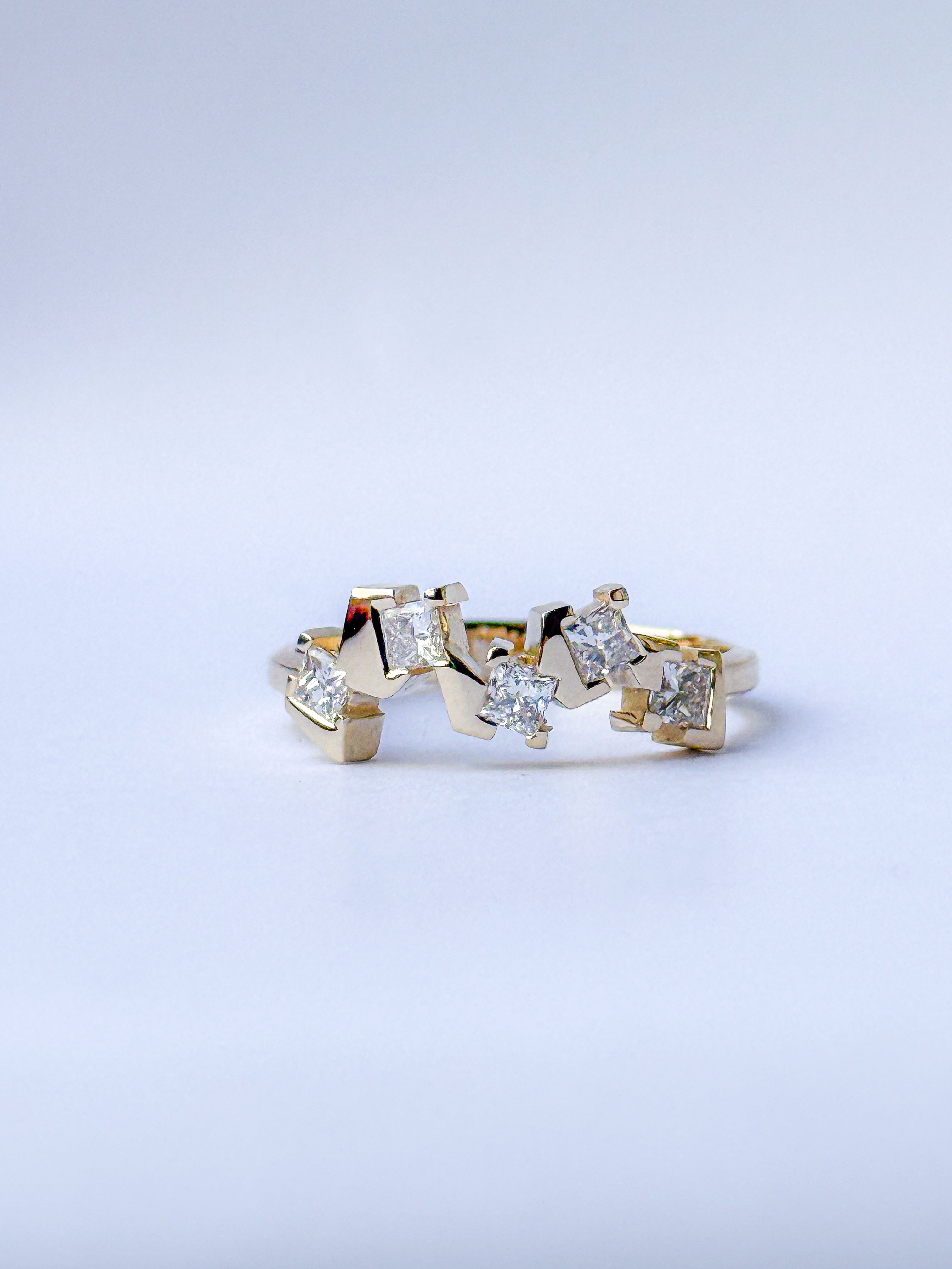 Gold ring with 5 square diamonds