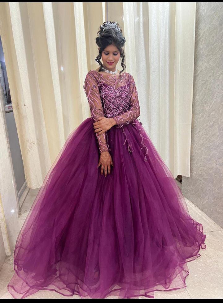 Girls purple party wear gown in soft net with sequence