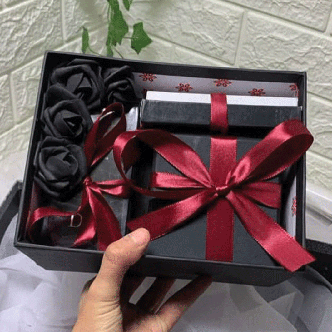 gift box with wrapping and flowers