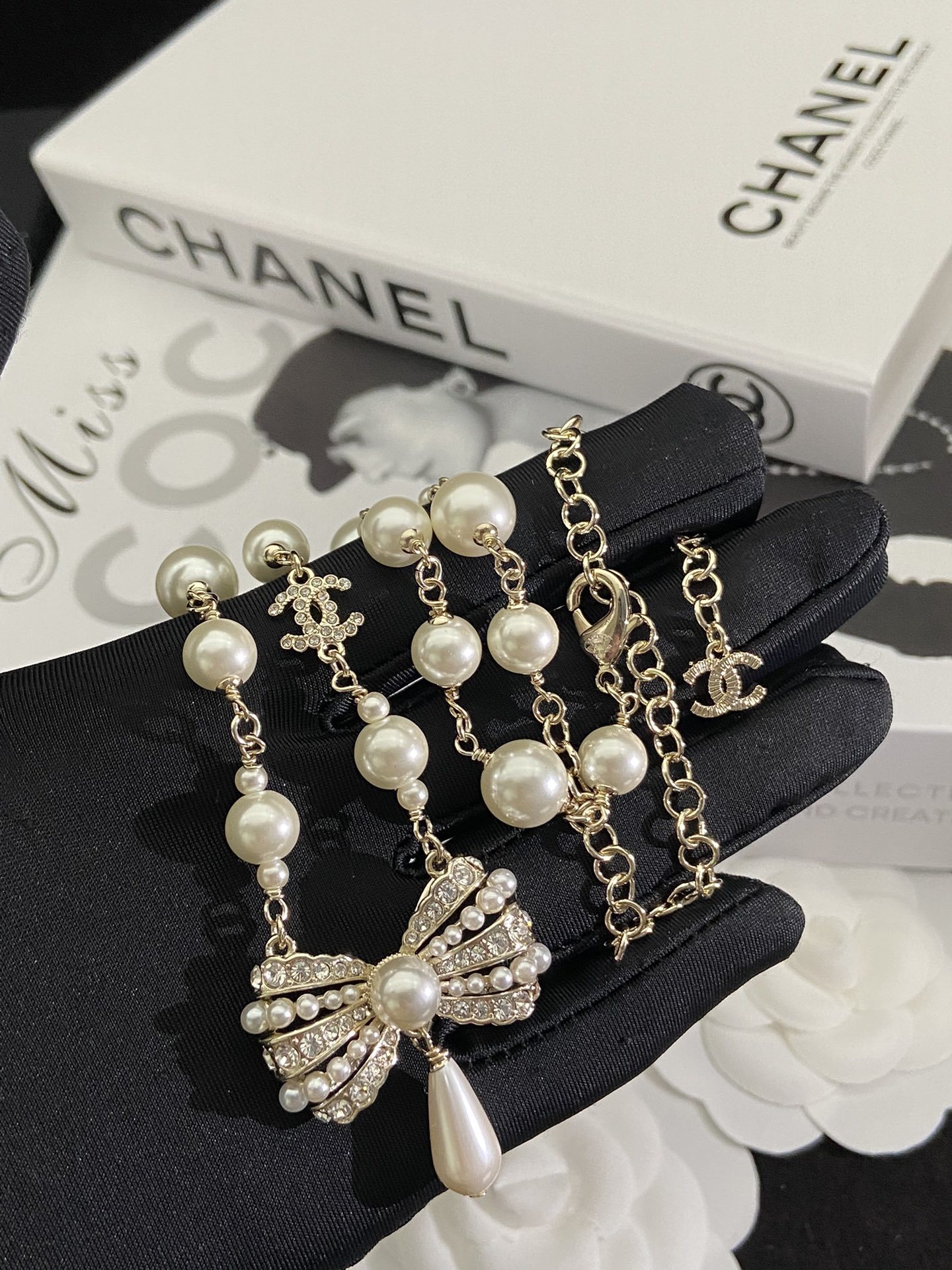 Pearl & Gold-Toned Jewelry Set with Bow & Crystal Accents (Necklace, 2 Earring Styles)