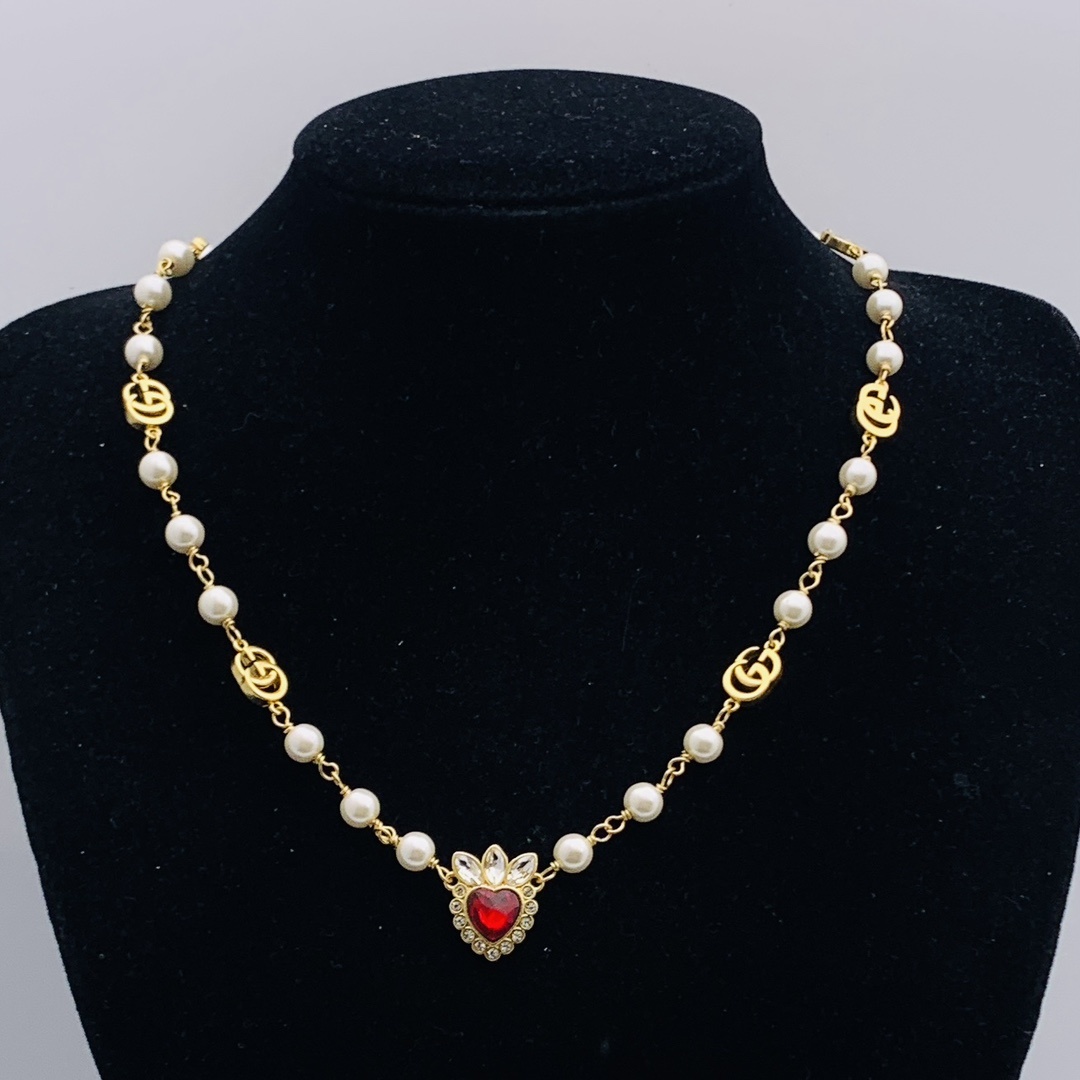Gold-Tone Pearl & Blue Crystal Heart Jewelry Set: Necklace & Bracelet