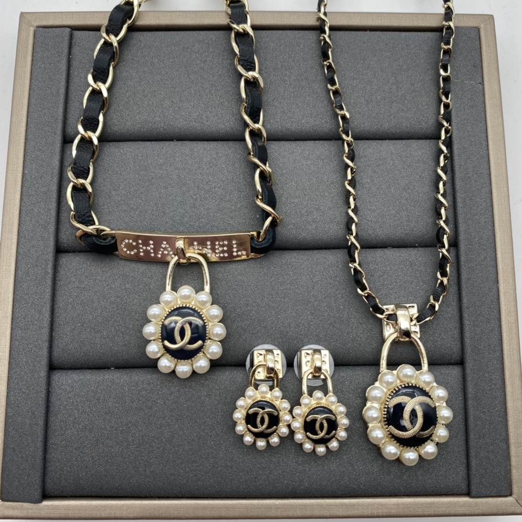Jewelry Set with Black PU Leather, Pearl, Enamel, and Interlocking Detail Accents in Gold Tones