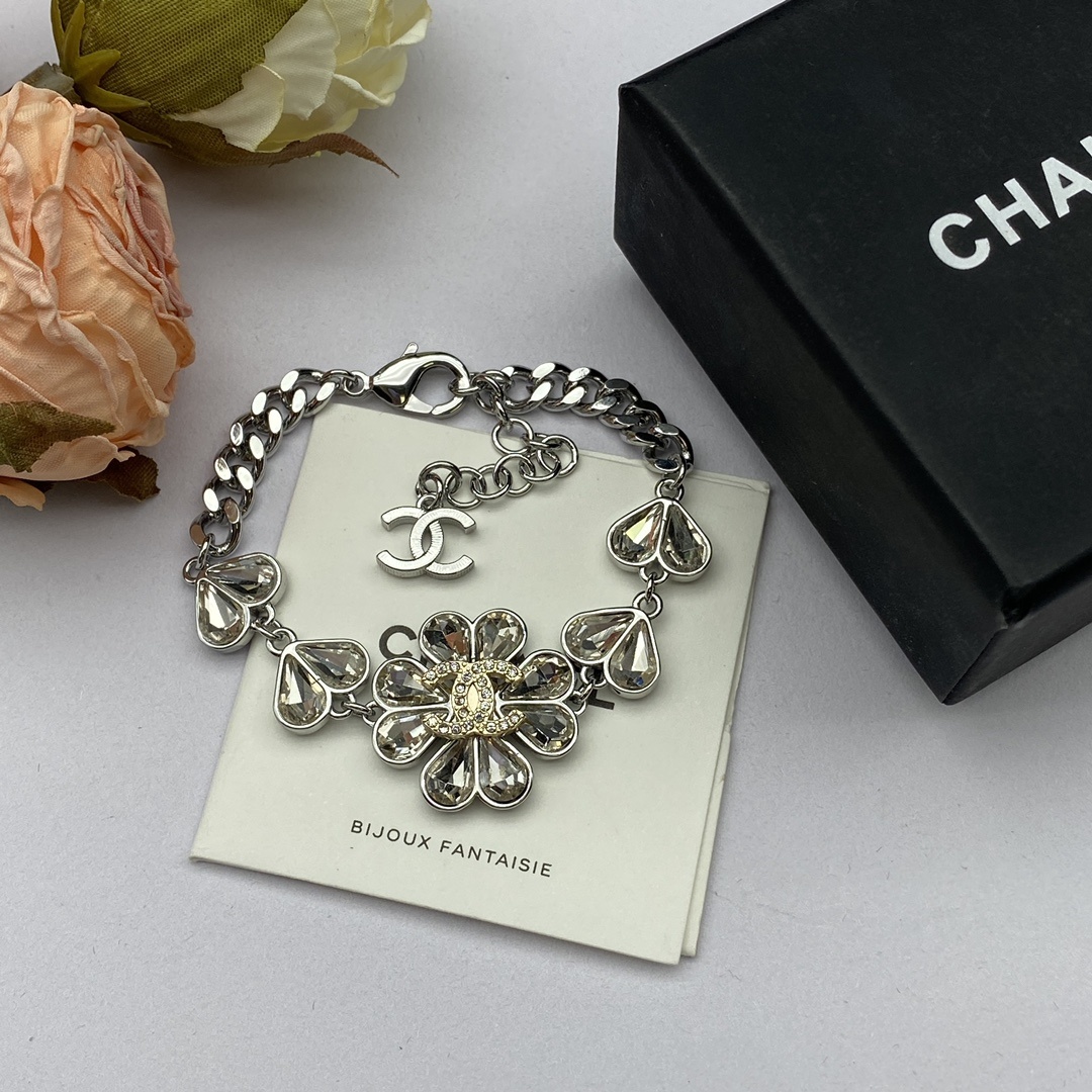  Silver-Toned Jewelry Set with Crystal Flower Motifs (Necklace, Bracelet, 2 Earring Styles, Ring)