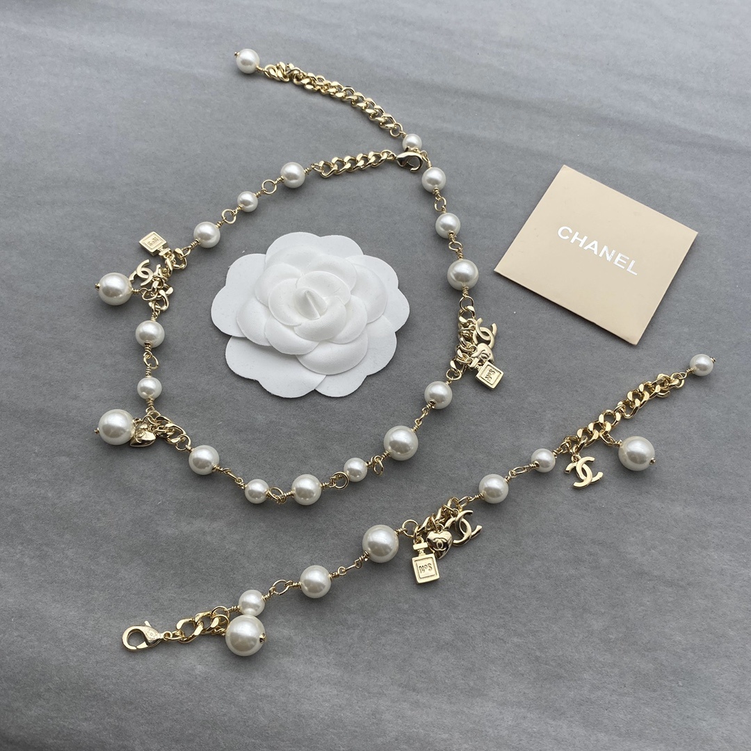 Gold-Toned Pearl & Charm Jewelry Set (Necklace, Bracelet)