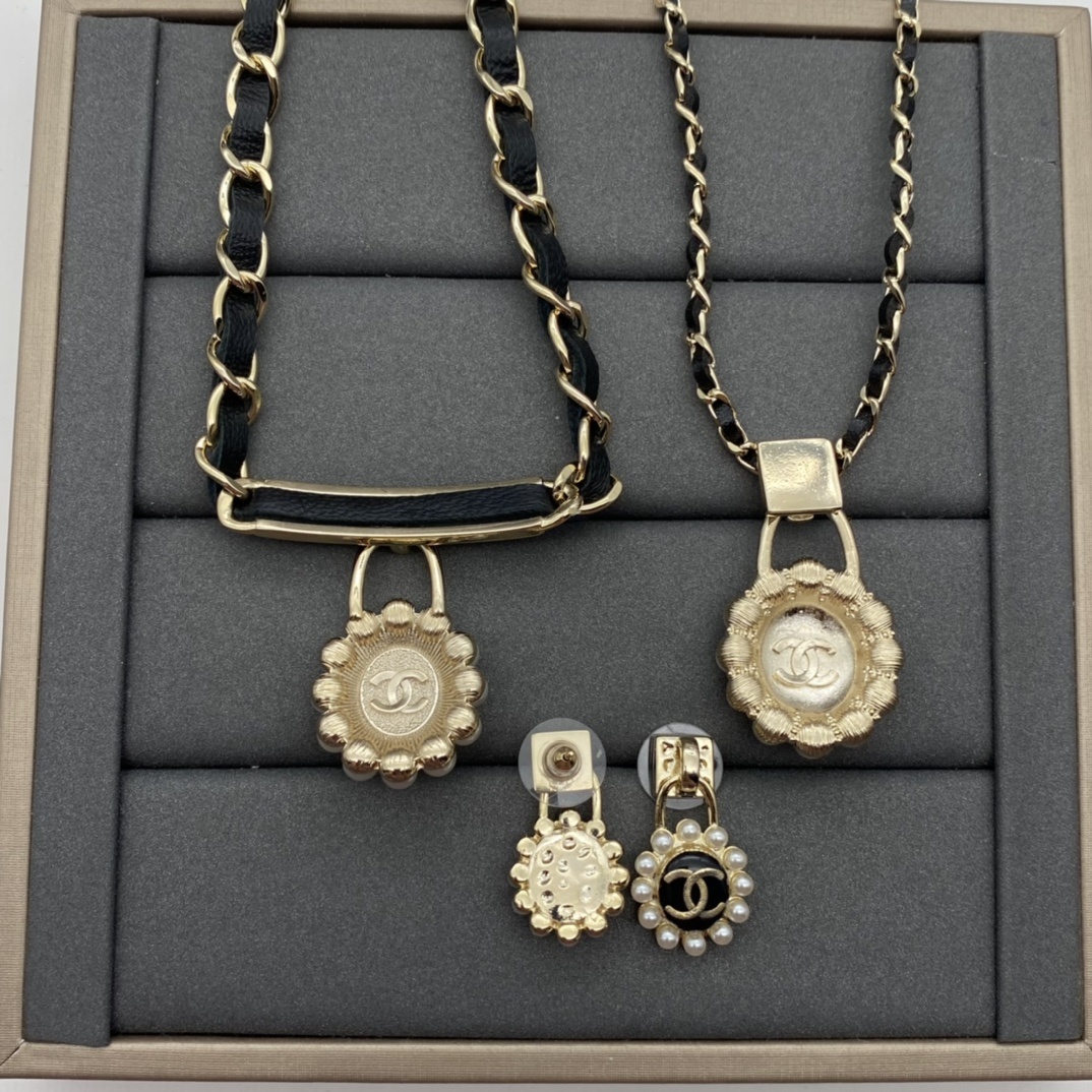 Jewelry Set with Black PU Leather, Pearl, Enamel, and Interlocking Detail Accents in Gold Tones