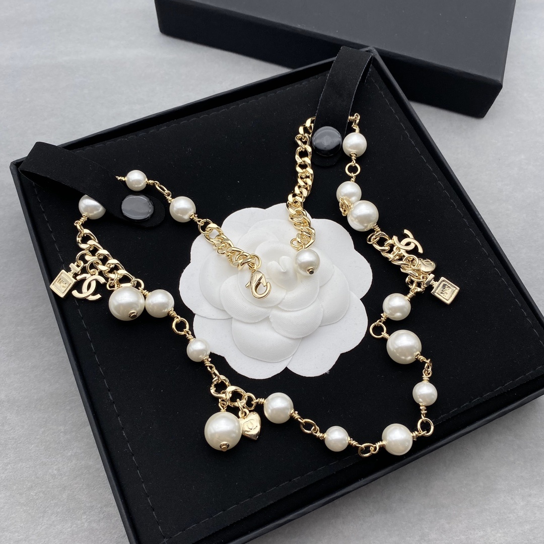 Gold-Toned Pearl & Charm Jewelry Set (Necklace, Bracelet)
