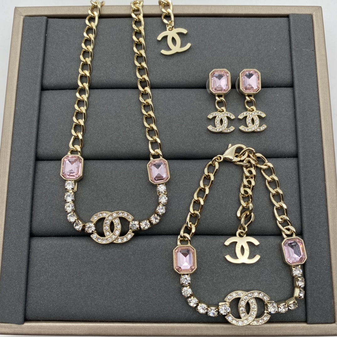 Gold-Toned Jewelry Set with Pink Gem & Crystal Interlocking Details
