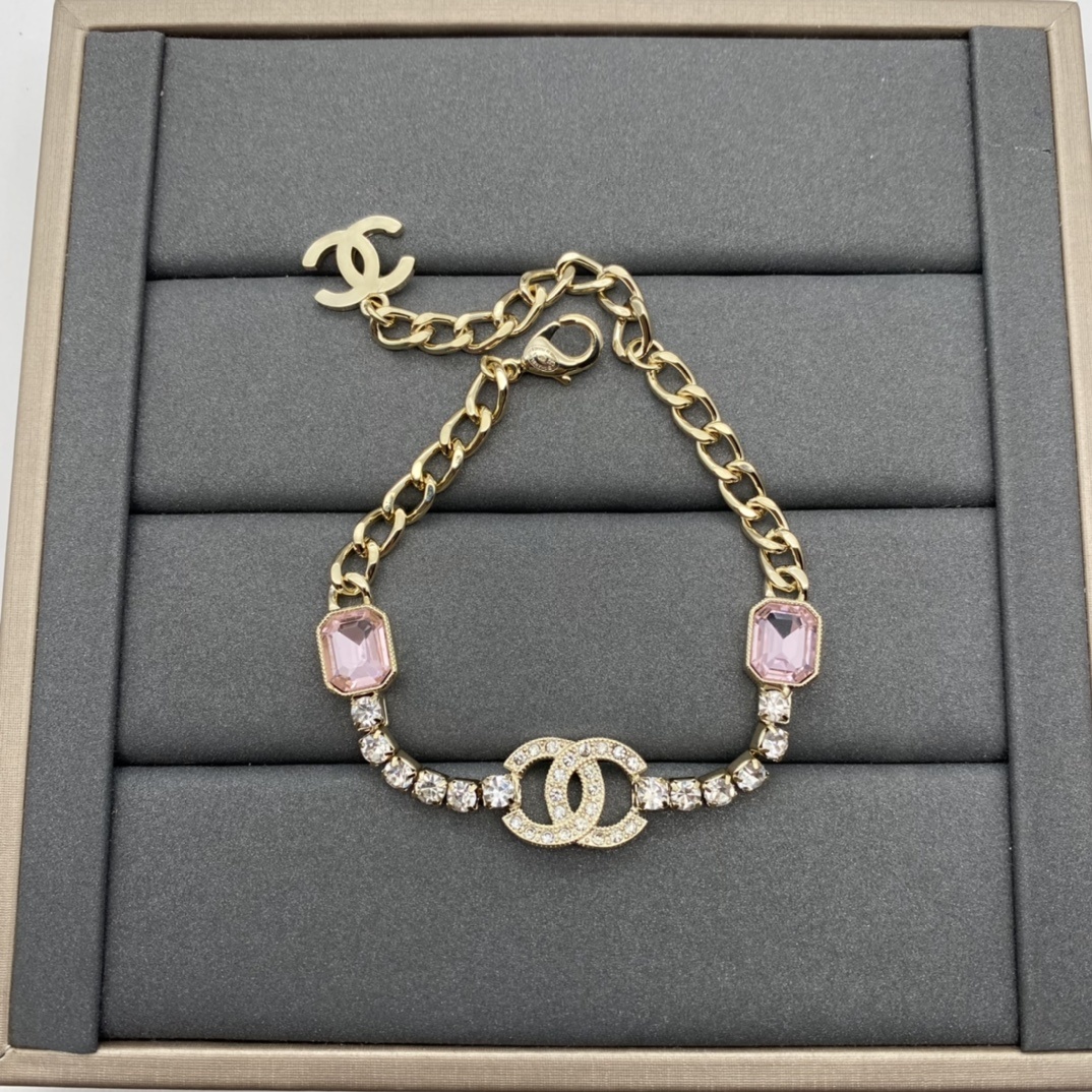 Gold-Toned Jewelry Set with Pink Gem & Crystal Interlocking Details