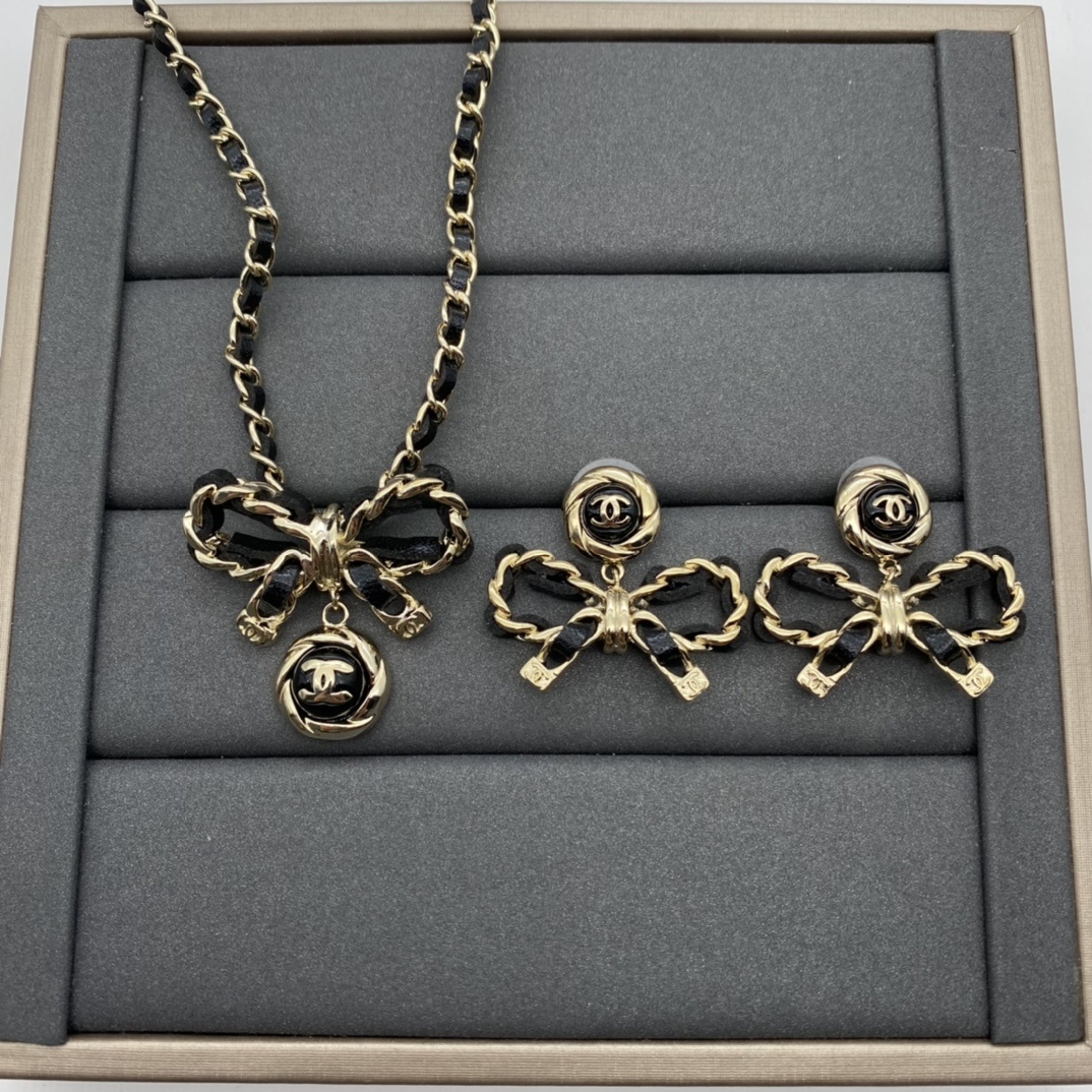 Two-Tone Jewelry Set with Bow & Textured Motifs (2 Necklaces, 2 Earring Styles)