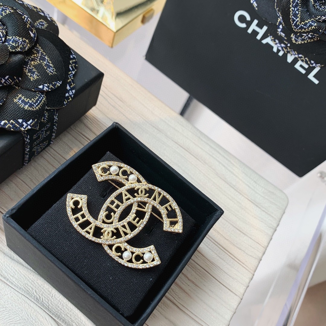 Gold-Tone Double-Loop Brooch with Lettering, Crystals and Pearls