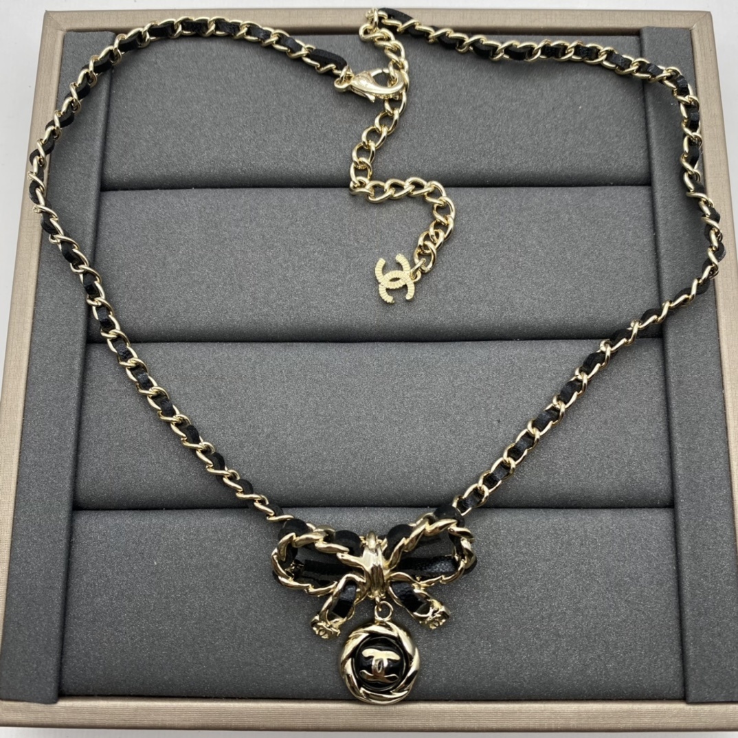 Two-Tone Jewelry Set with Bow & Textured Motifs (2 Necklaces, 2 Earring Styles)