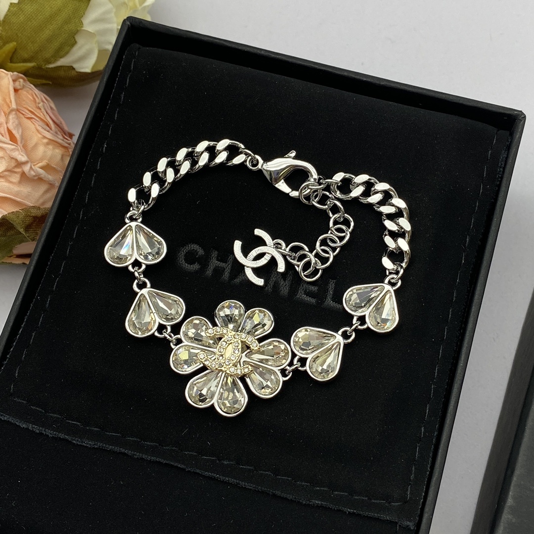  Silver-Toned Jewelry Set with Crystal Flower Motifs (Necklace, Bracelet, 2 Earring Styles, Ring)