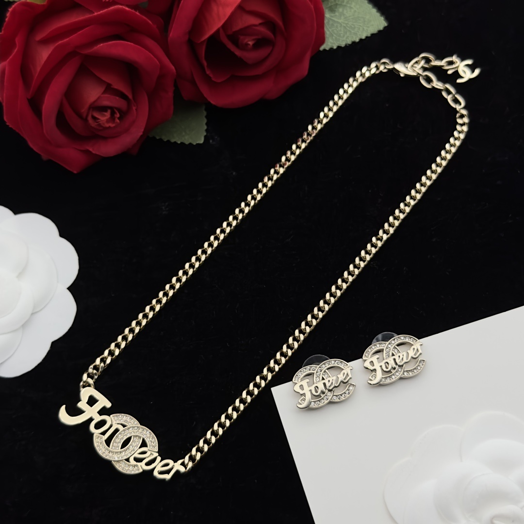 Gold-Toned Jewelry Set with "Forever" Crystal Motif (Necklace, Earrings)