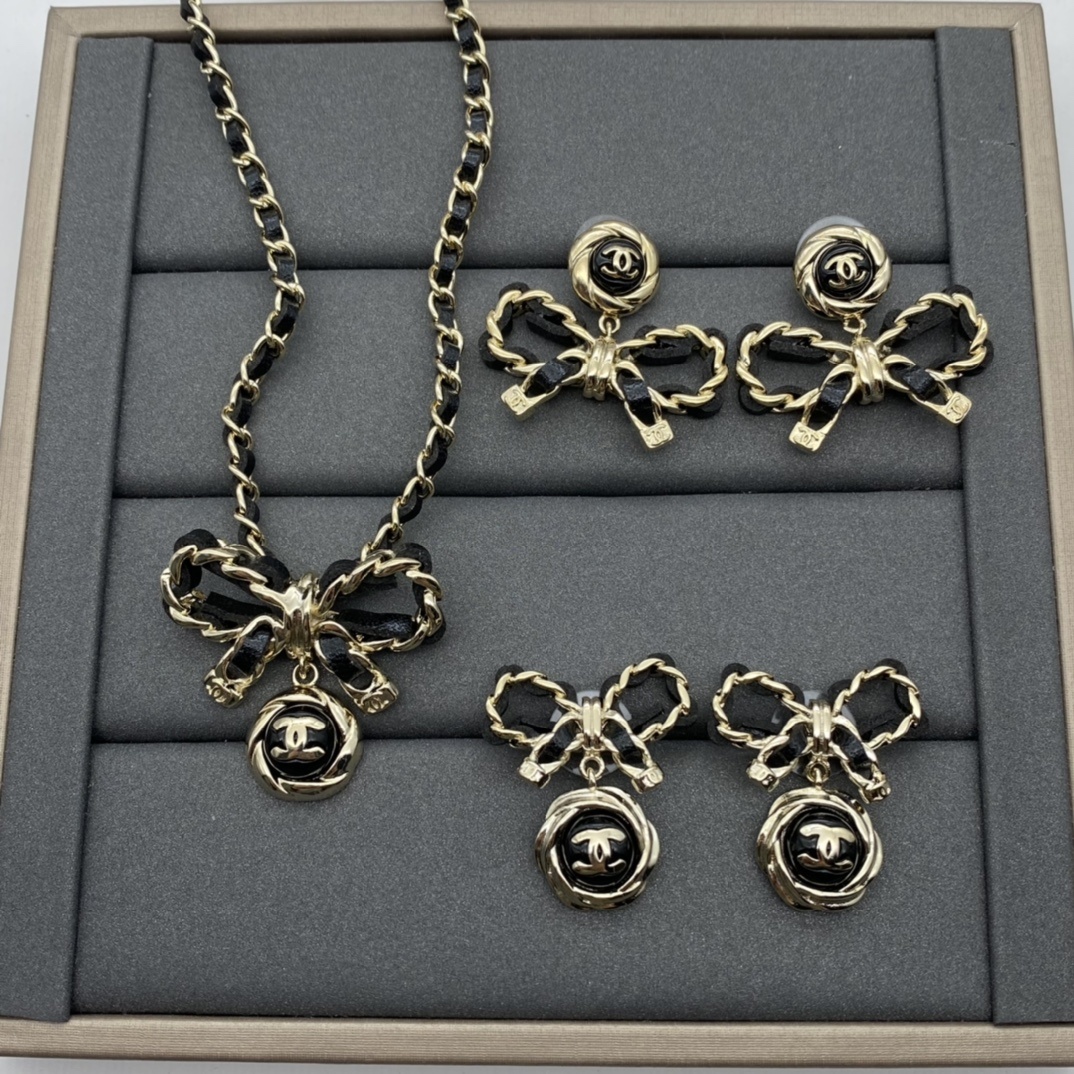 Two-Tone Jewelry Set with Bow & Textured Motifs (2 Necklaces, 2 Earring Styles)