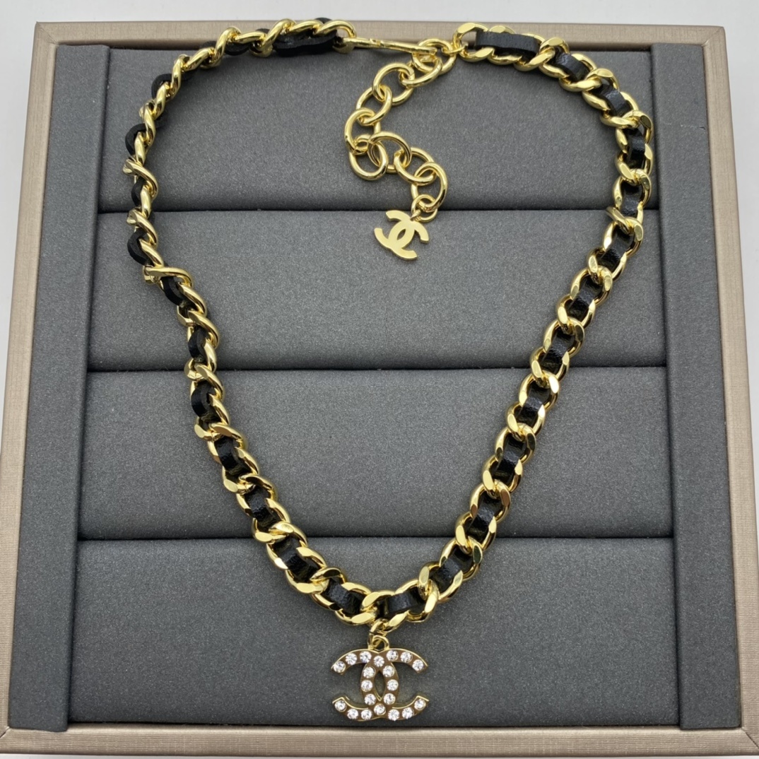 Jewelry Set with Black PU Leather, Crystal, and Interlocking Detail Accents in Gold Tones