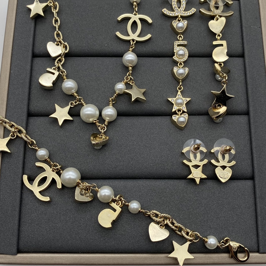 Gold-Toned Pearl & Whimsical Charm Jewelry Set (Necklace, Bracelet, 2 Earring Styles)