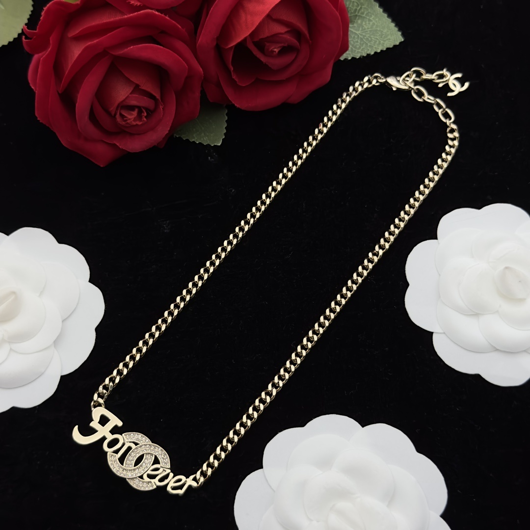 Gold-Toned Jewelry Set with "Forever" Crystal Motif (Necklace, Earrings)