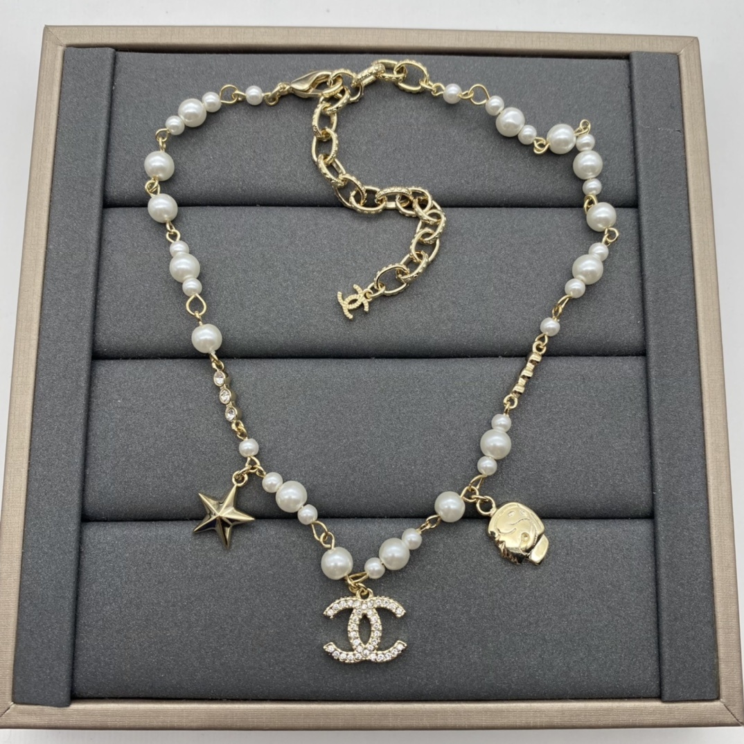 Gold-Toned Pearl & Whimsical Charm Jewelry Set (Necklace, Bracelet)