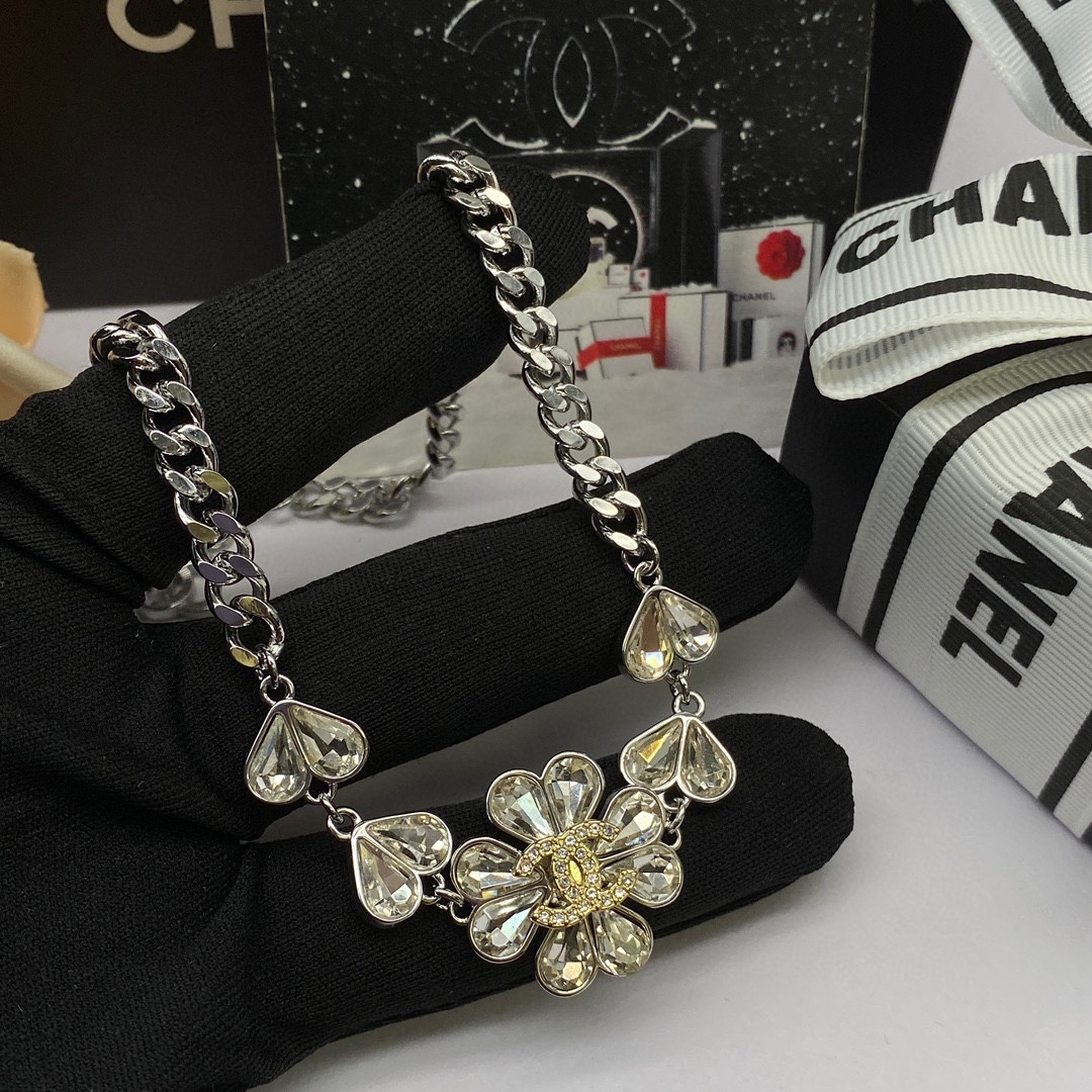  Silver-Toned Jewelry Set with Crystal Flower Motifs (Necklace, Bracelet, 2 Earring Styles, Ring)