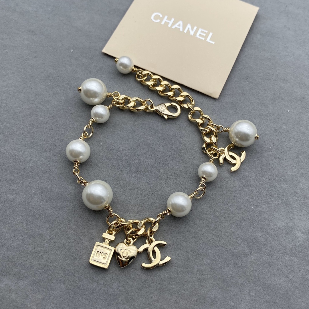 Gold-Toned Pearl & Charm Jewelry Set (Necklace, Bracelet)