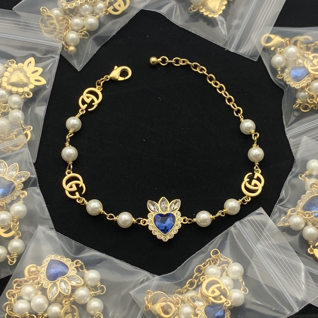 Gold-Tone Pearl & Blue Crystal Heart Jewelry Set: Necklace & Bracelet