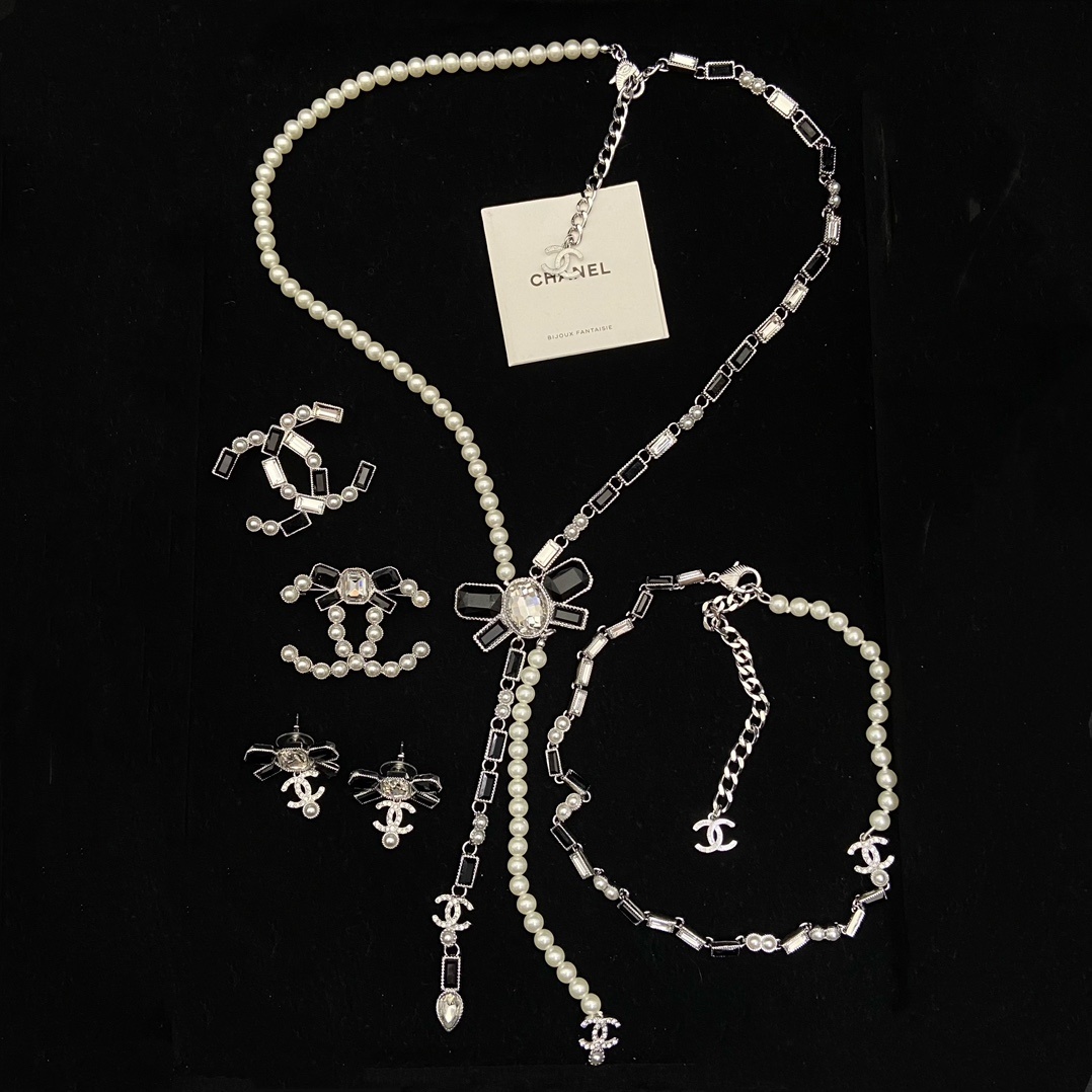 Silver-Toned Jewelry Set with Black Accent & Crystal Bow Motifs (2 Necklaces, 3 Earring Styles, 4 Brooches)