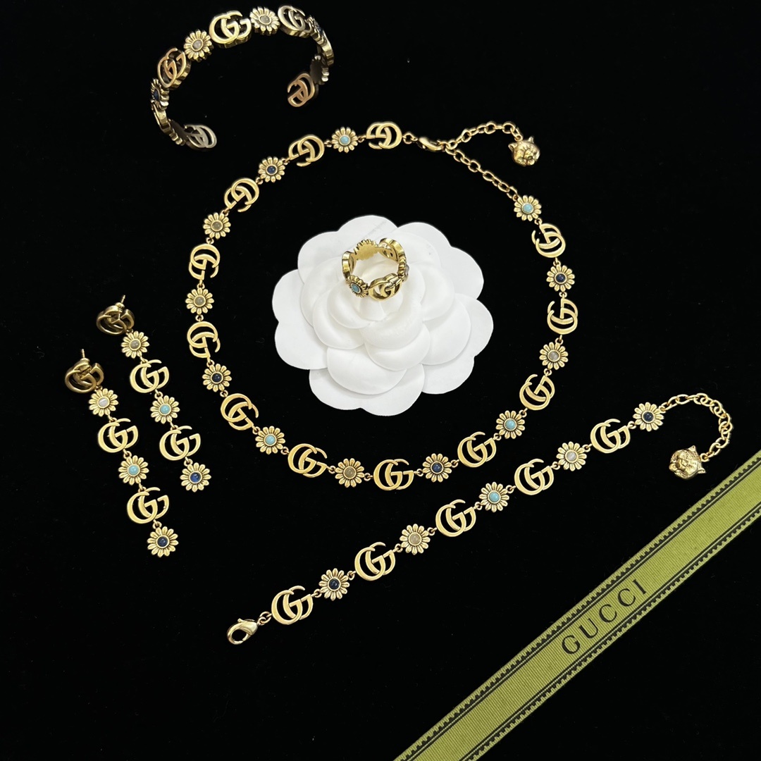 Gold-Tone Floral & Geometric Jewelry Set: Necklace, Bracelet, Cuff, Earrings & Ring